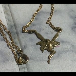 Gold tone pretty fairy with wings necklace